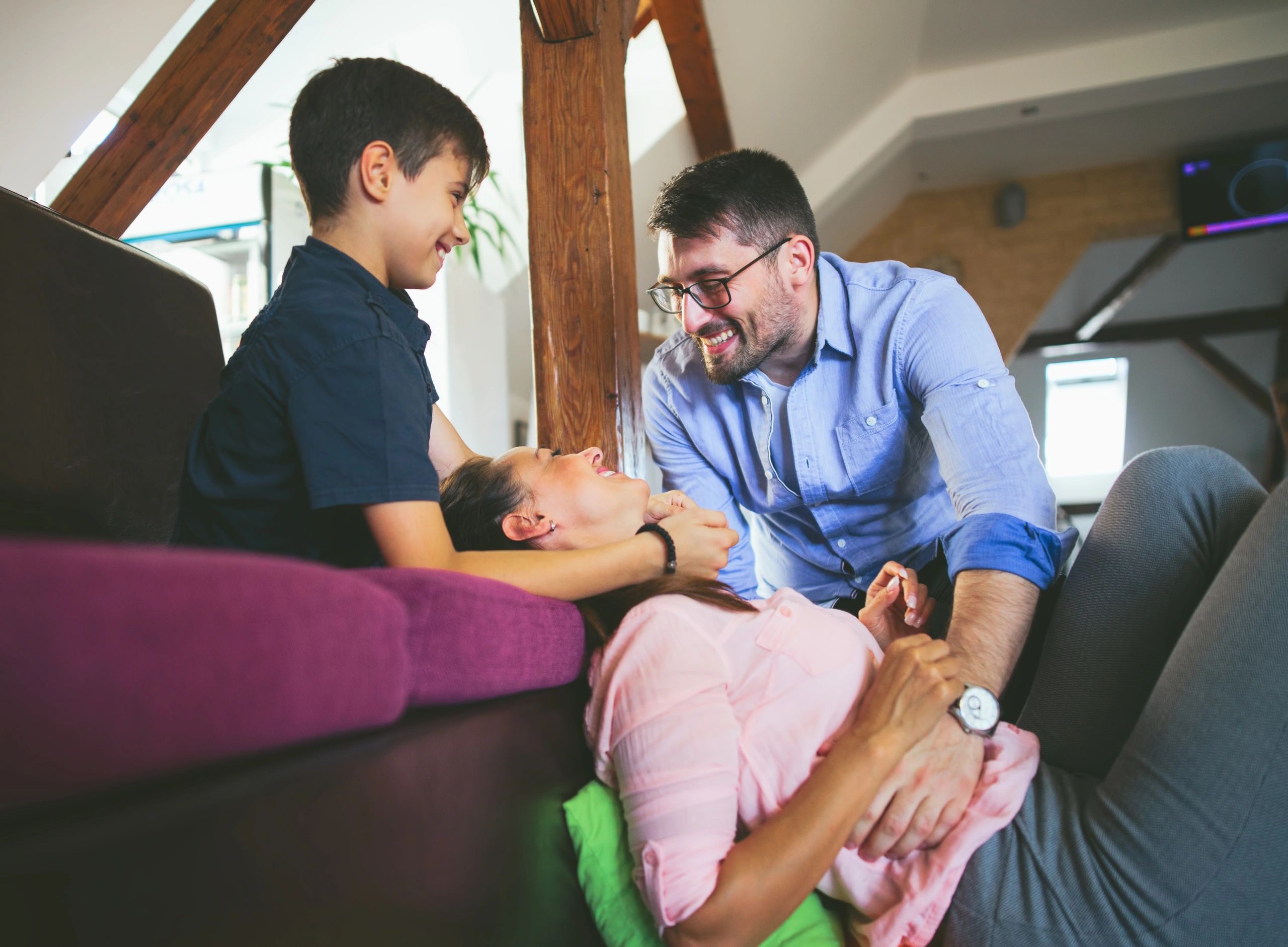 Family sharing a playful moment at home